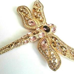 Spilla grande a forma di libellula placcata in oro firmata Swarovski con castone e pavé di cristalli